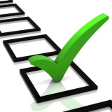 graphic of checklist with green check mark