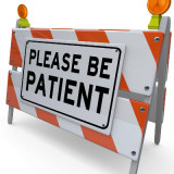 Construction warning sign: please be patient
