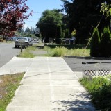 A sidewalk ends in this newer part of Portland, Oregon.