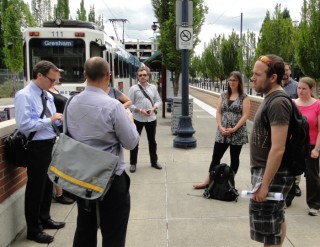 IMCL conference attendees arriving at downtown Hillsboro light-rail station.