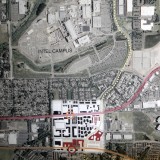 This aerial map shows most of the Orenco development. On the south, the red circle shows the location of the light rail stop (there is more housing south of this); the yellow circle shows the location of the commercial Town Center on NE Cornell Road, a major arterial. The massive Intel facility is adjacent to the Orenco development to the north.