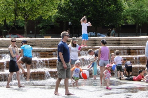 Playing in the water in Jamison Square