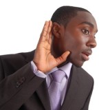photo of a man listening
