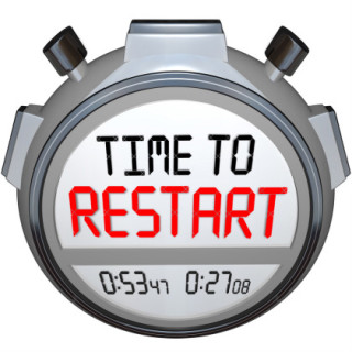 Stop watch that says "Time to Restart"