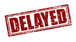 stamp with the word "Delayed"